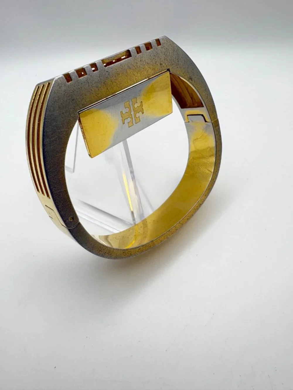 Tory Burch surface flip noticeable
